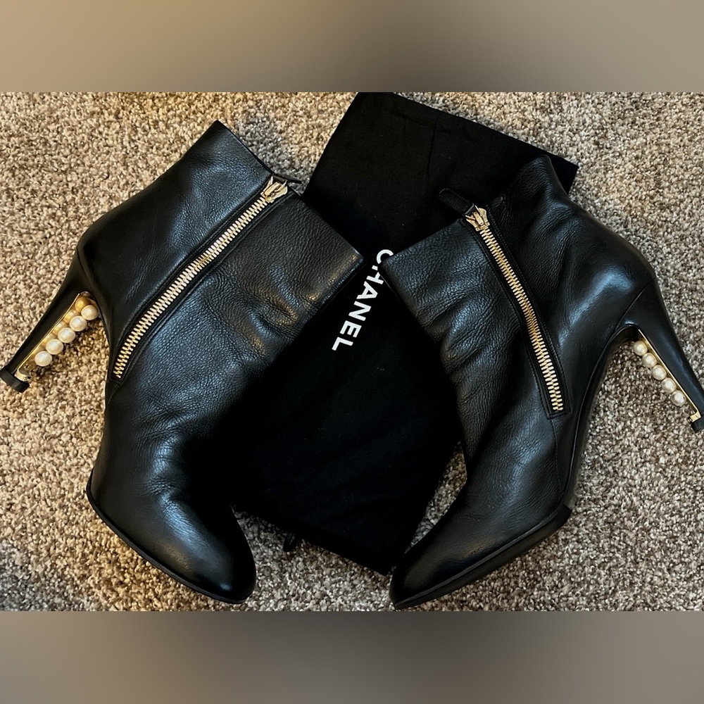 CHANEL Black Leather Boots with Gold Zipper and Pearl Heel